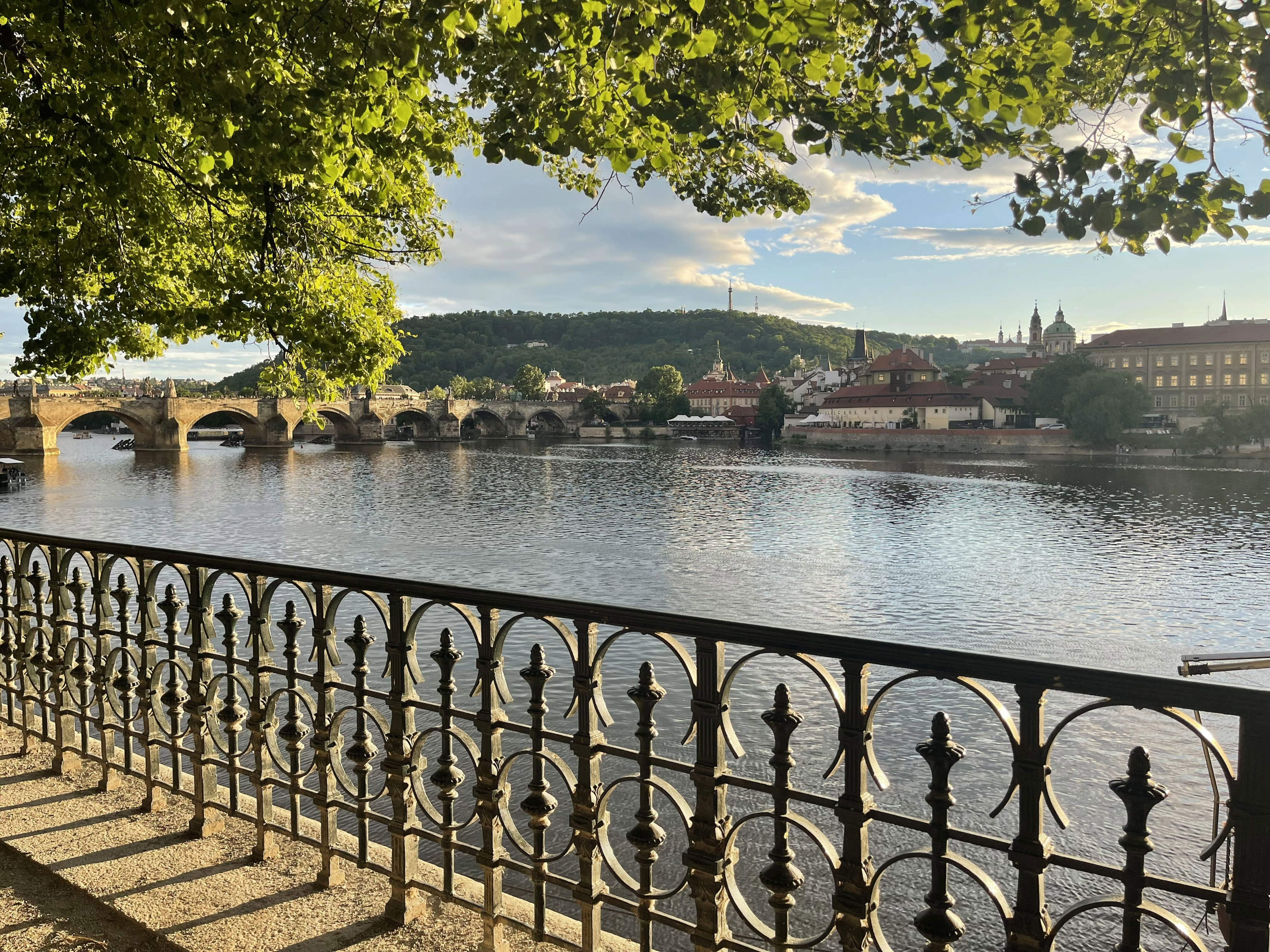Custom travel advisor itineraries — view of Charles Bridge and Prague Castle along the Vltava River
